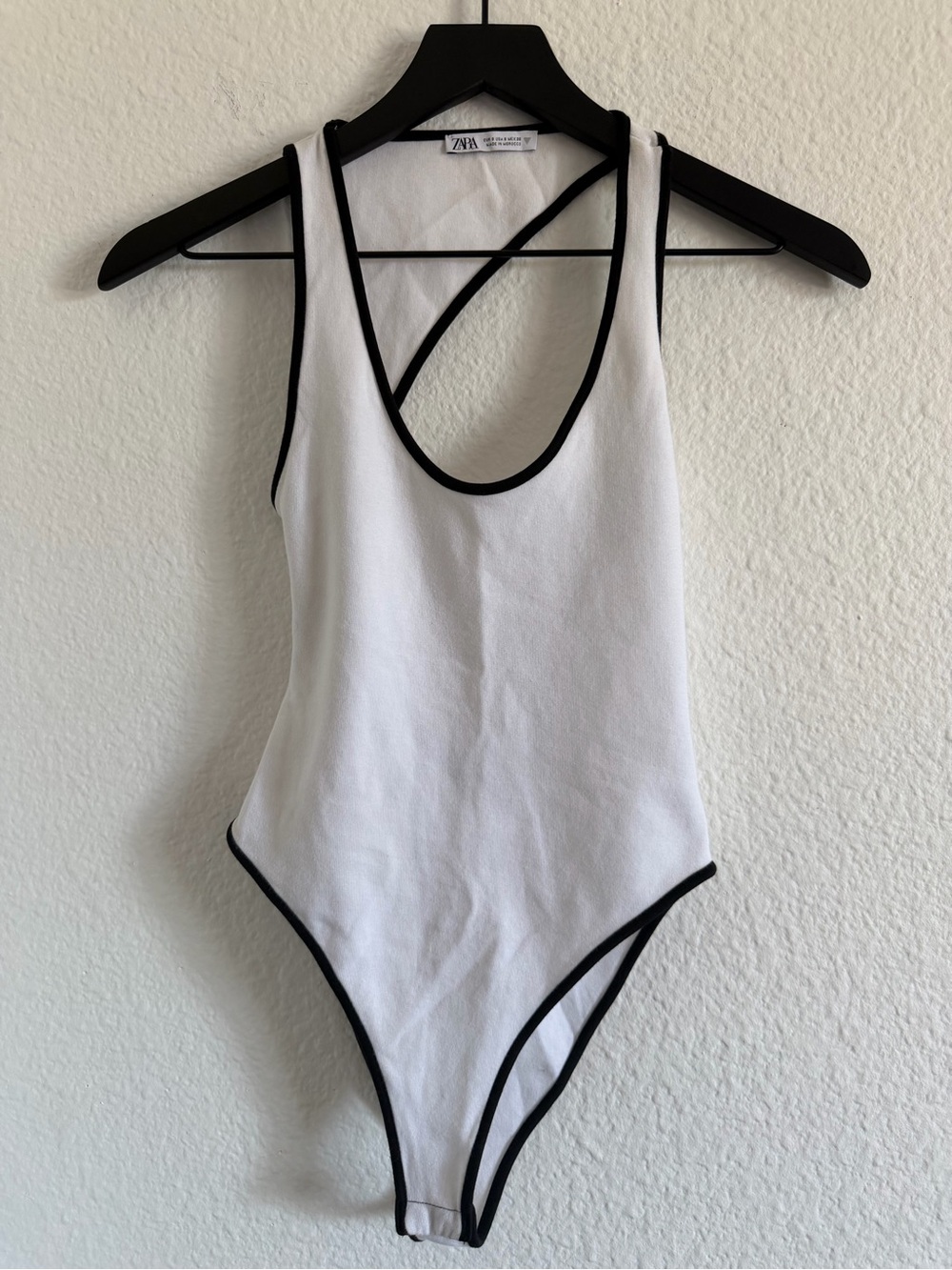 zara bodysuit with black trim